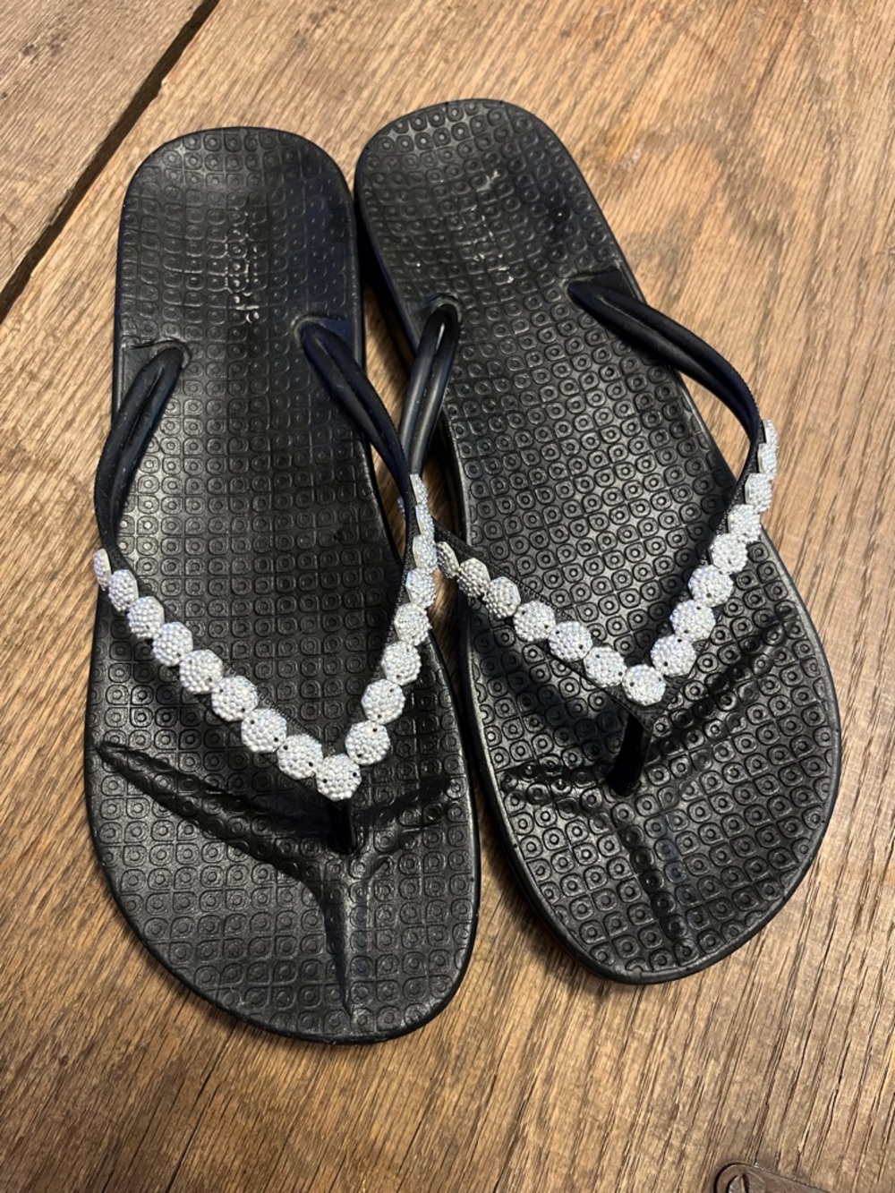 Capelli of New York Black Flip Flop Sandals with Silver Beaded Straps